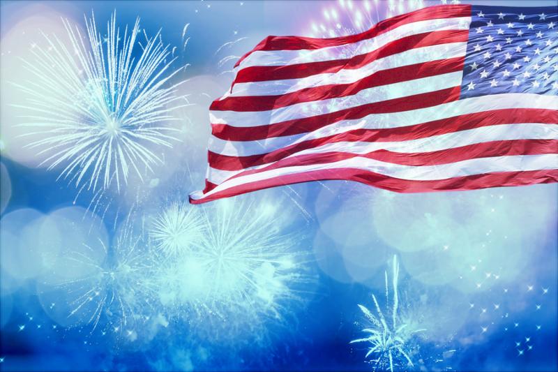 Celebrating Independence Day. United States of America USA flag with fireworks background for 4th of July