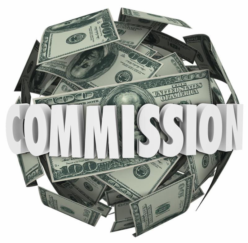 Commission word on a ball of hundred dollar bills earn money sales