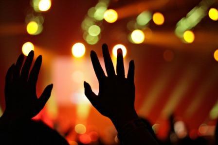 Raised hands in worship
