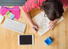 Designer sketching on paper