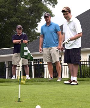 Taylor golfing