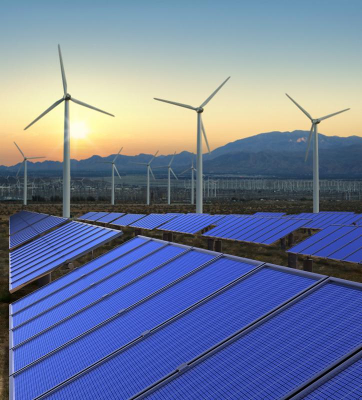 A high quality stock picture of solar panels and wind turbines