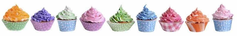 Delicious cupcakes isolated on white