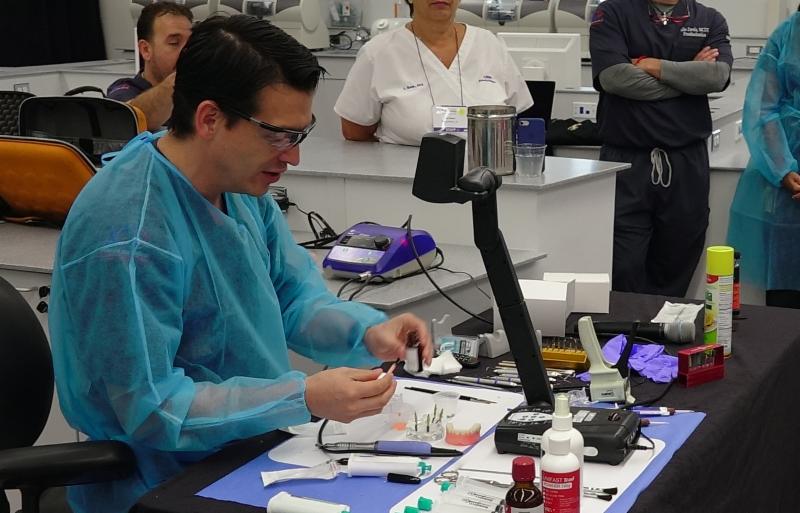 Dr. Marco Brindis demonstrating hybrid dentures
fabrication techniques