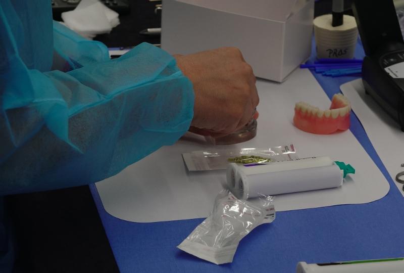 Dr. Marco Brindis demonstrating hybrid dentures
fabrication techniques