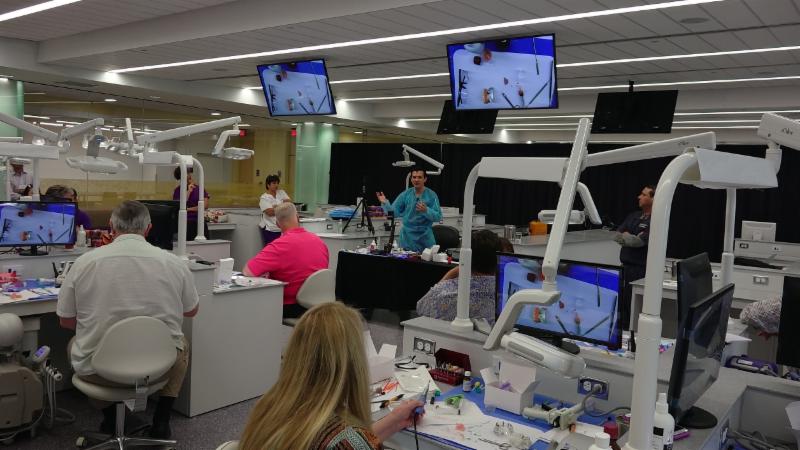 Dr. Marco Brindis lecturing at Hybrid Dentures
course