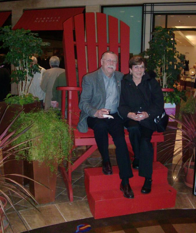 Clark and his wife Donna relax at exhibit created at Chestnut Hill Mall