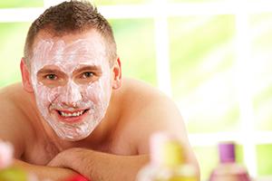Man in facial cream