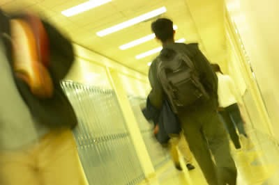 student-walking-hallway.jpg