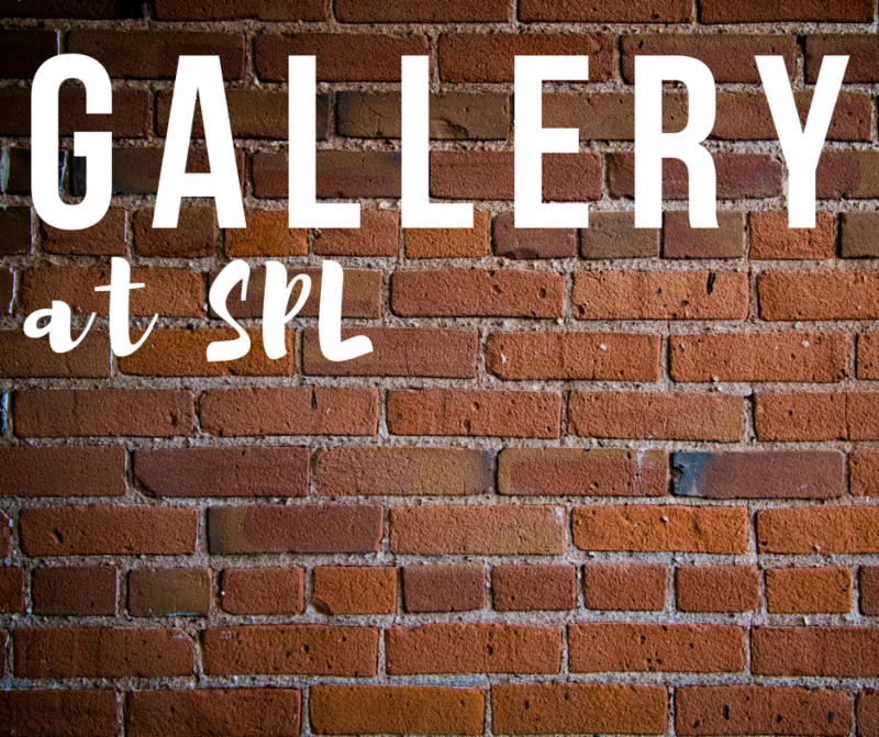 Gallery at SPL on brick wall