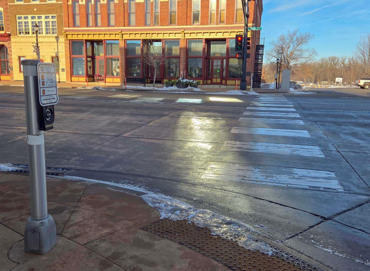 Pedestrian crossing at Plum and Main Street intersection