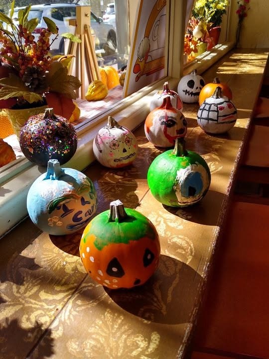 Painted pumpkins in the window