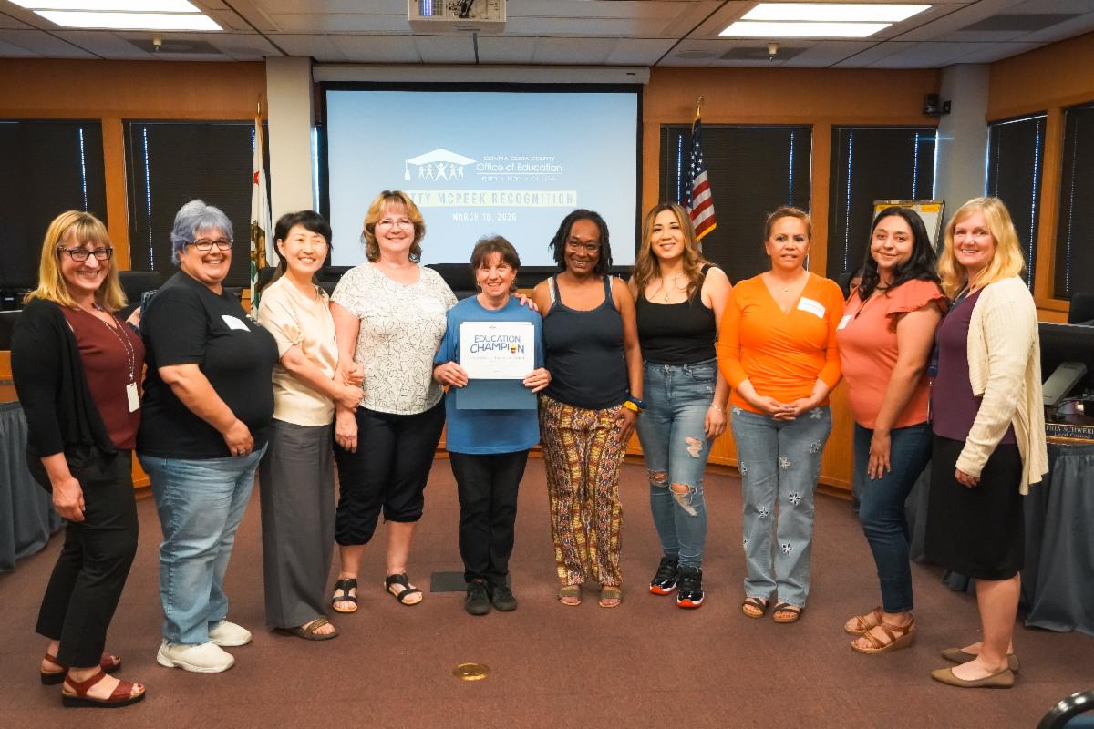 Betty McPeek with staff members from CCCOE's Turner School