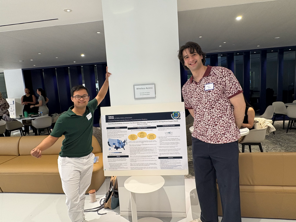 2 GULEND students with their poster