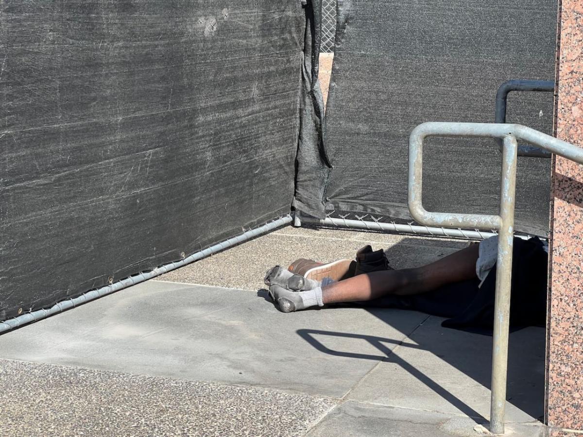 Homeless senior sleeps on the steps of the LA County Board of Supervisors Board Room