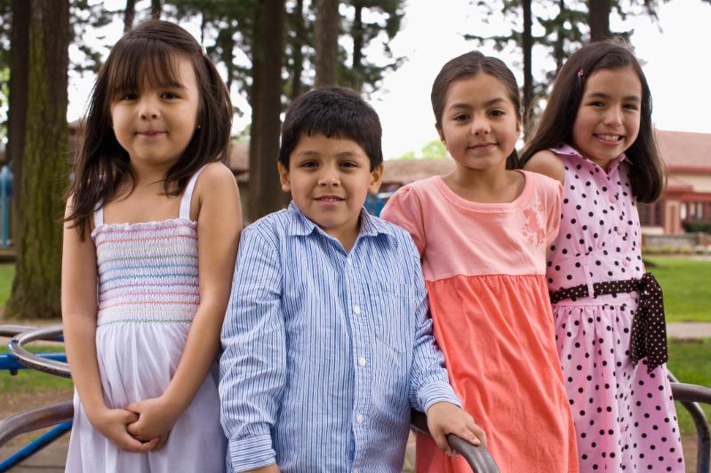 Four kids on carousel
