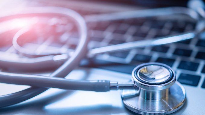 stethoscope on laptop