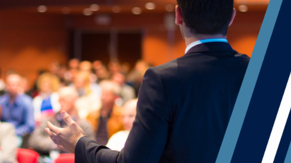 person presenting in front of audience
