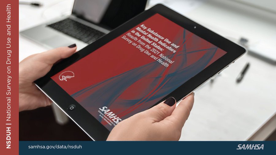 provider holding tablet with NSDUH report on screen