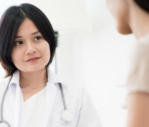doctor talking to patient