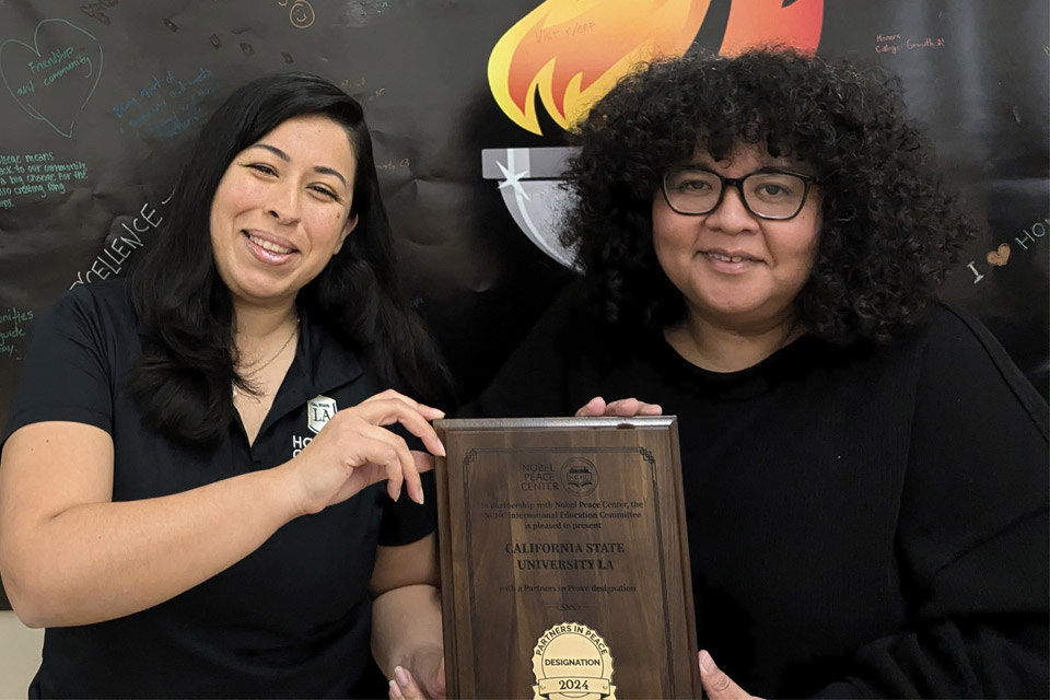 Cal State LA's Honors Thesis and Major Fellowship Coordinator Sonia Cruz Magana and Honors Admissions Coordinator Marylu Castillo.
