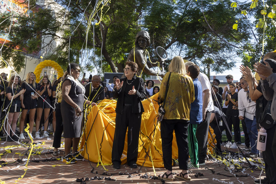 Billie Jean King unveils statue in her honor during a dedication ceremony.