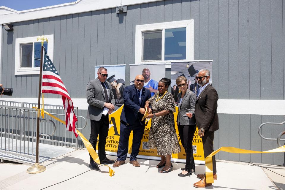 Photo: California Institution for Men's (CIM) Associate Director Travis Pennington, far left, and Warden Eric Mejia join Cal State LA President Berenecea Johnson Eanes, Provost Heather Lattimer, and Prison Graduation Initiative Director Bidhan Roy.