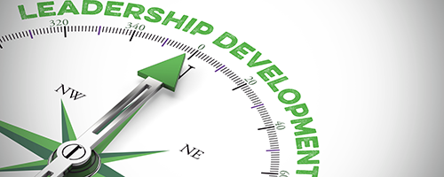 compass with leadership development text on it