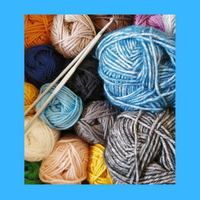 A bunch of different colored yarns.
