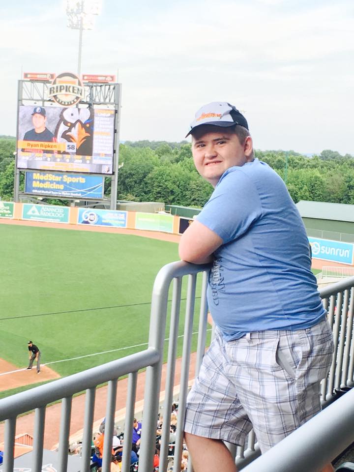 Student Patrick Hagen looking over the baseball field at Ripken Stadium during a Connect program event. 