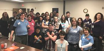 Participants and volunteers of the Salina Empower Me workshop gather for a group photo