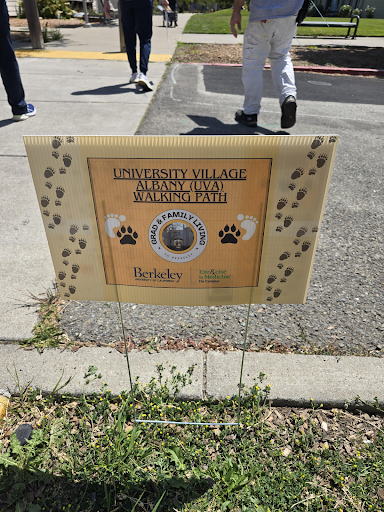 University Village Walking Path Lawn Sign