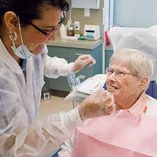 older woman at a dental hygeine appointment