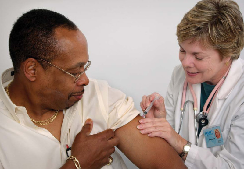 man getting an immunization