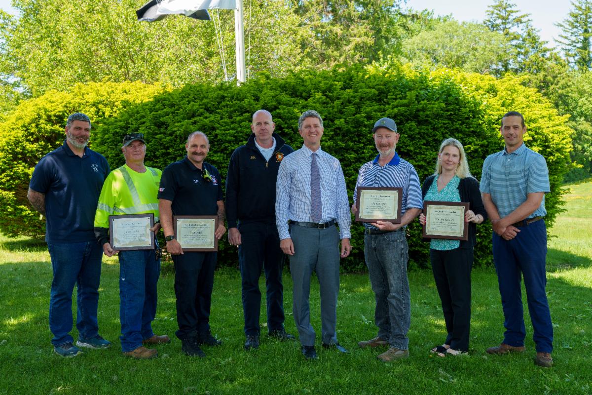 Group picture of 4 staff and 4 department heads for the public service recognition