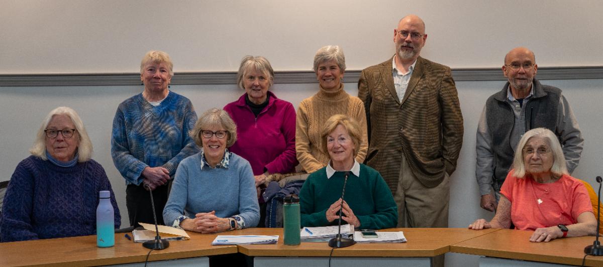Group picture of the Health & Human Services board of ten members in two rows, one sitting one standing
