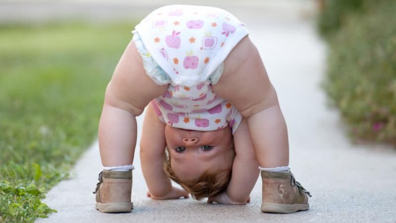 baby_playing_upside_down.jpg
