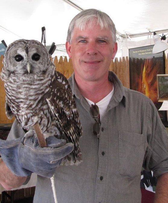Patrick Comins with Owl