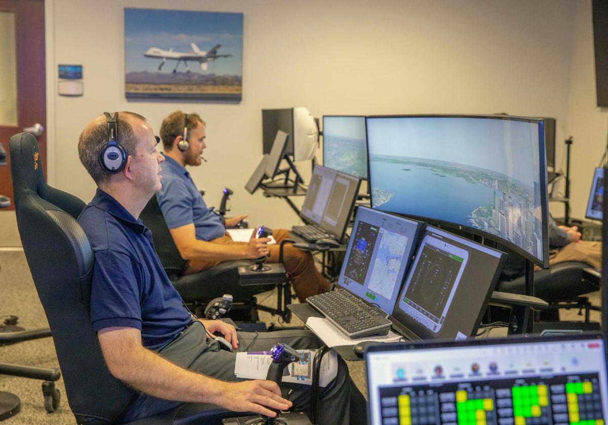Andy Burroughs and Paul Friz in the roles of air taxi pilots running through air taxi integration simulations focusing on urban air space at NASAâ€™s Langley Research in Hampton Virginia on Sept. 25 2024.