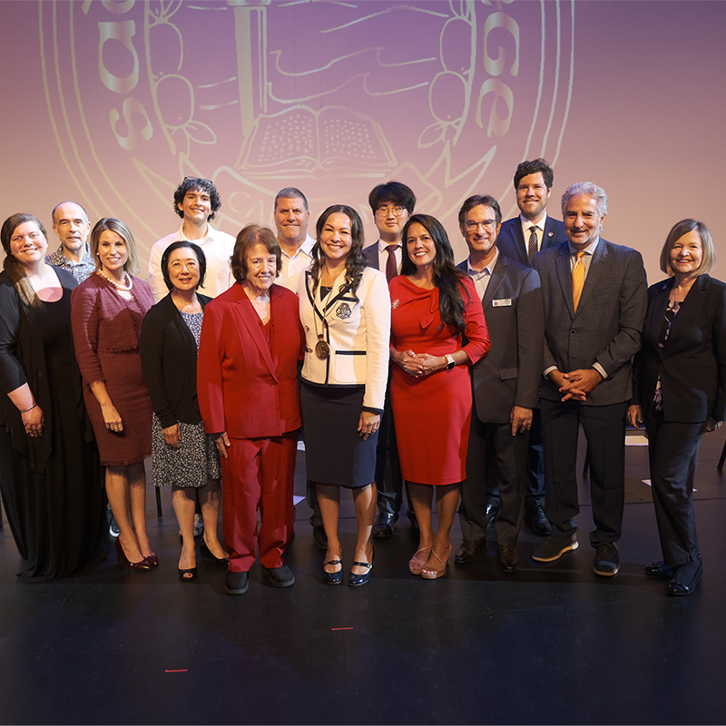 president lonita cordova posing with board and admin for installation event