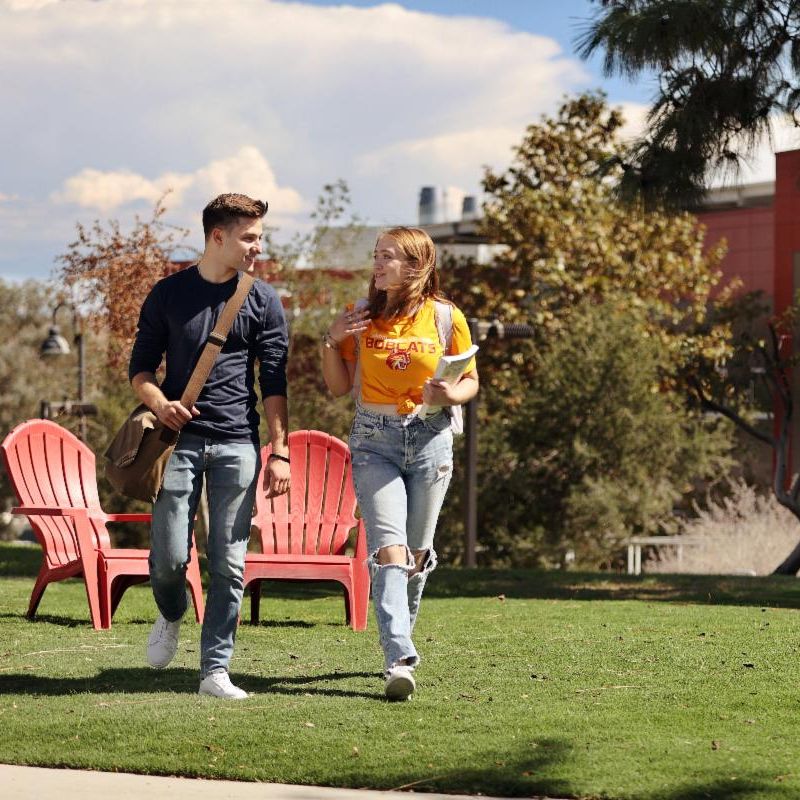 student walk on saddleback campus