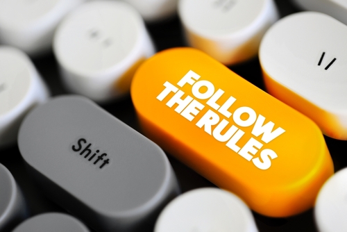 Follow The Rules is an instruction or directive to adhere to a set of established guidelines_ regulations_ or principles_ text concept button on keyboard
