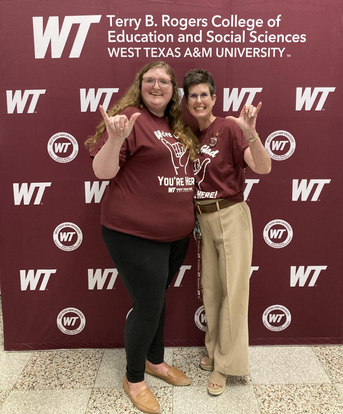 Heidi and Michelle helping direct students
