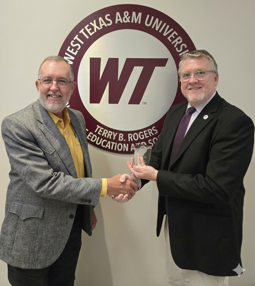 Faculty Award. Dr. Nix w/ Dr. Bigham