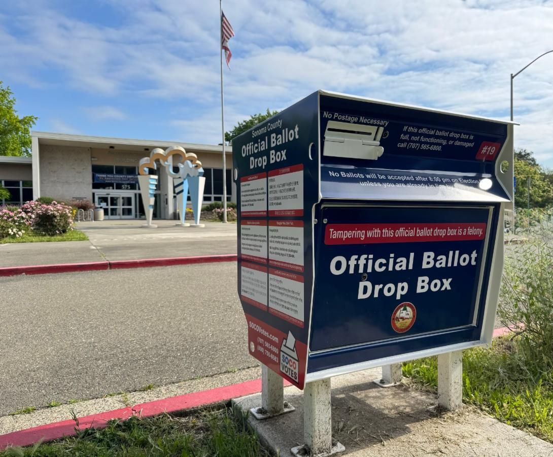 Photo of a Sonoma County election ballot drop box near a curb