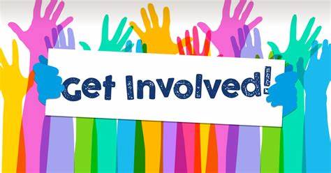 Image of hands in a variety of colors holding a sign that says to get involved