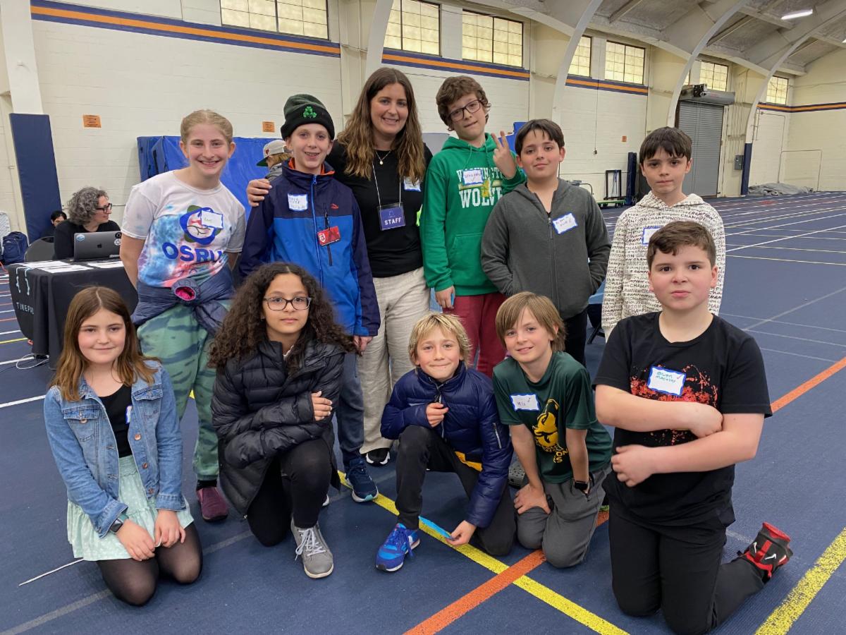 A group of D65 students poses for a group photo at the 2nd Tunepad Showcase.