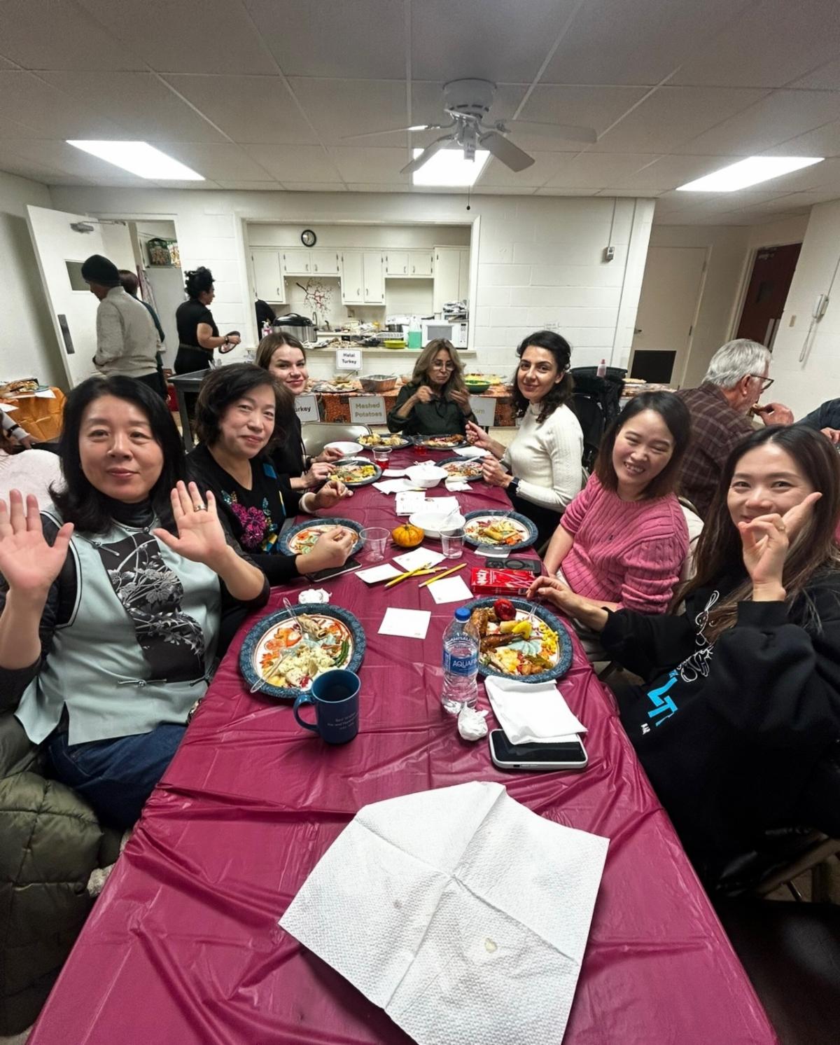 International adult education tudents at potluck