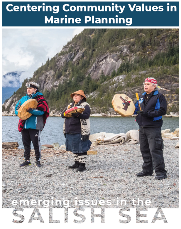 Three indigenous peoples playing drums and singing on a rocky shore.