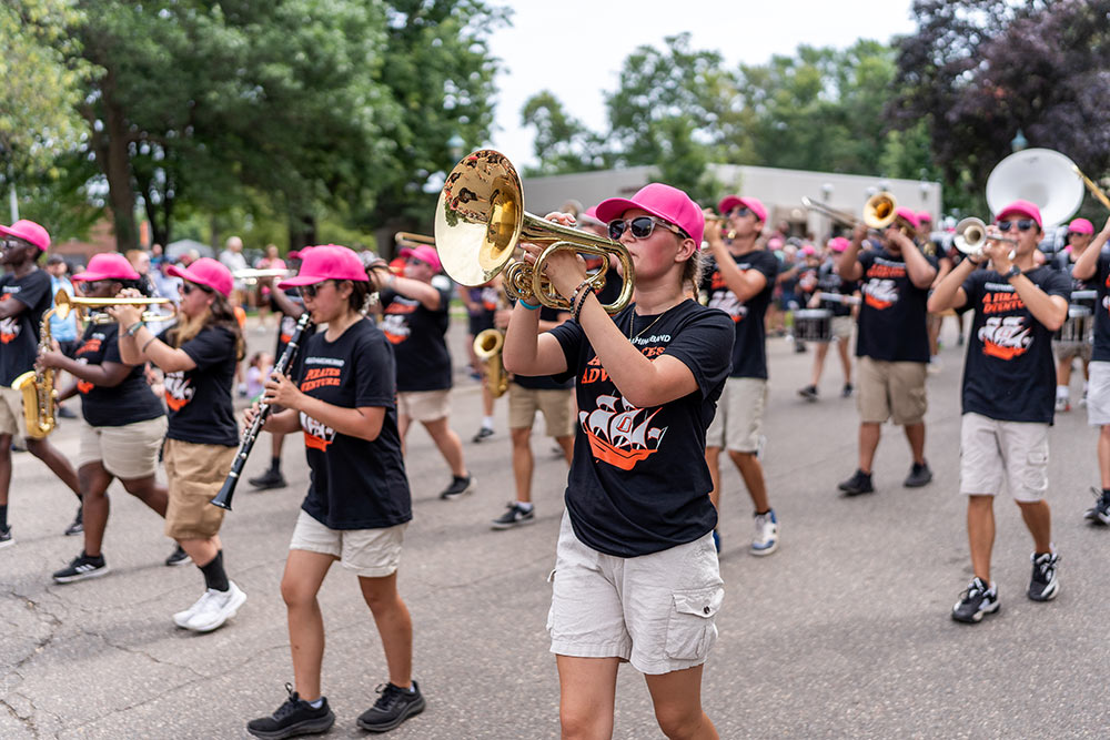 A band marches in the daily parade.